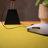 1.3 mm ultra flexible OP1 8K replacement cable shown in use with white gaming mouse on mousepad