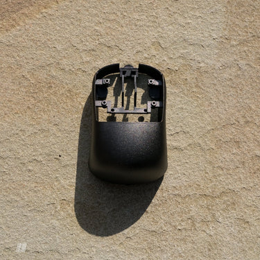 Top view of OPT1P fingertip modkit installed on OP1 mouse
