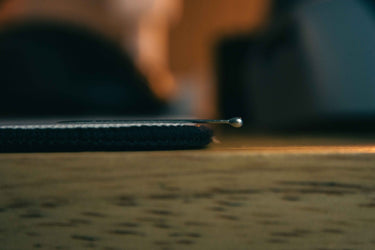 Stitched edge and thickness profile of The Girl cloth mousepad
