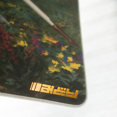 Mouse pad with colorful floral design and brand logo on a white background